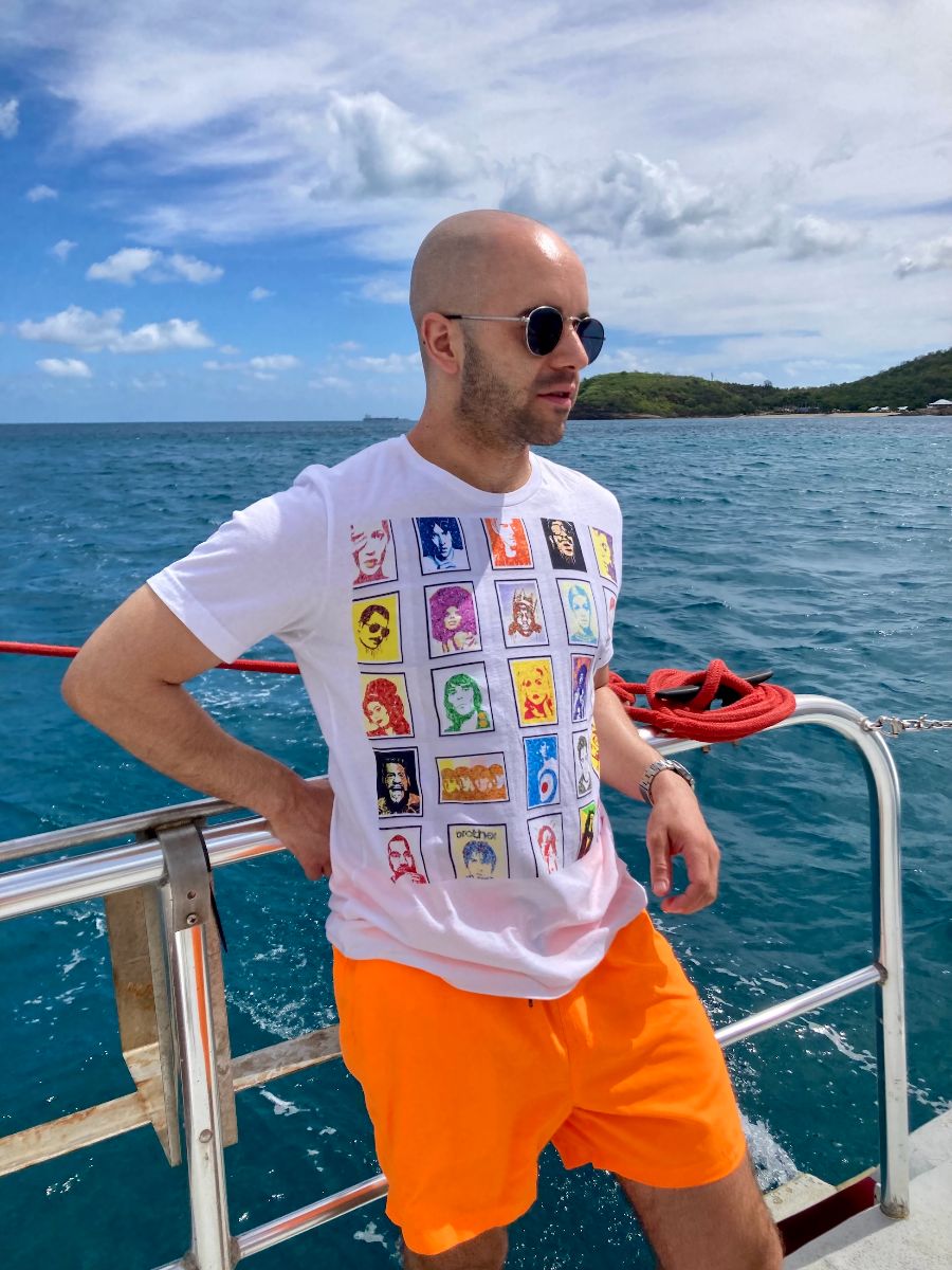 UK artist Kerwin Blackburn wearing his pop art merchandise in Barbados | By Kerwin