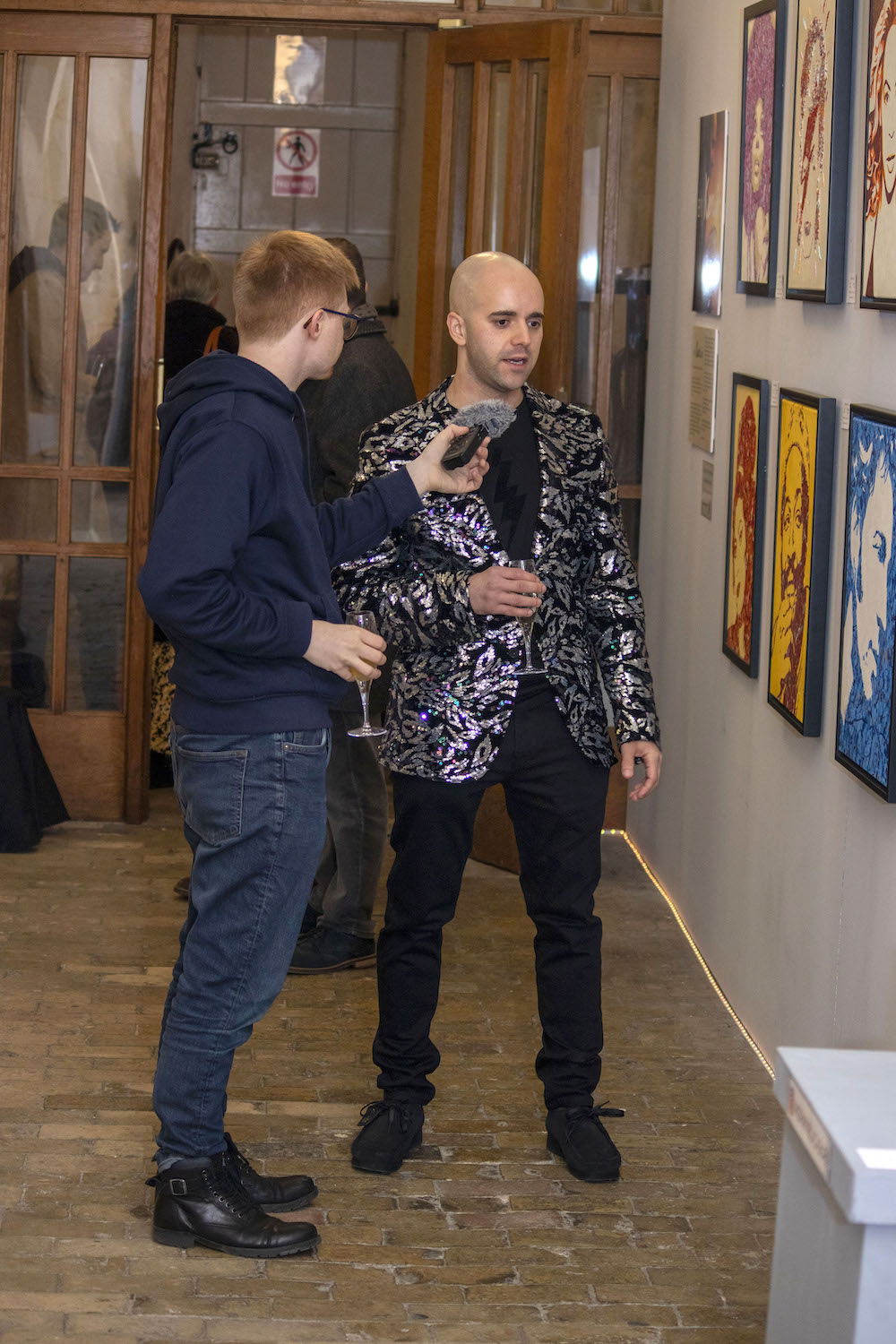 Kerwin Blackburn interviewed by BBC Radio Norfolk while exhibiting his Jackson Pollock-inspired pop art music paintings at the Crypt Gallery at Norwich School in Norfolk, February-March 2022 | By Kerwin