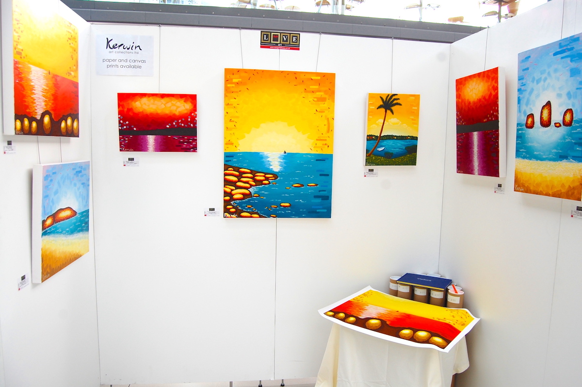 Kerwin Blackburn exhibiting his range of Kerwin Art Collections seascape paintings in 2012 at The Forum, Norwich | By Kerwin