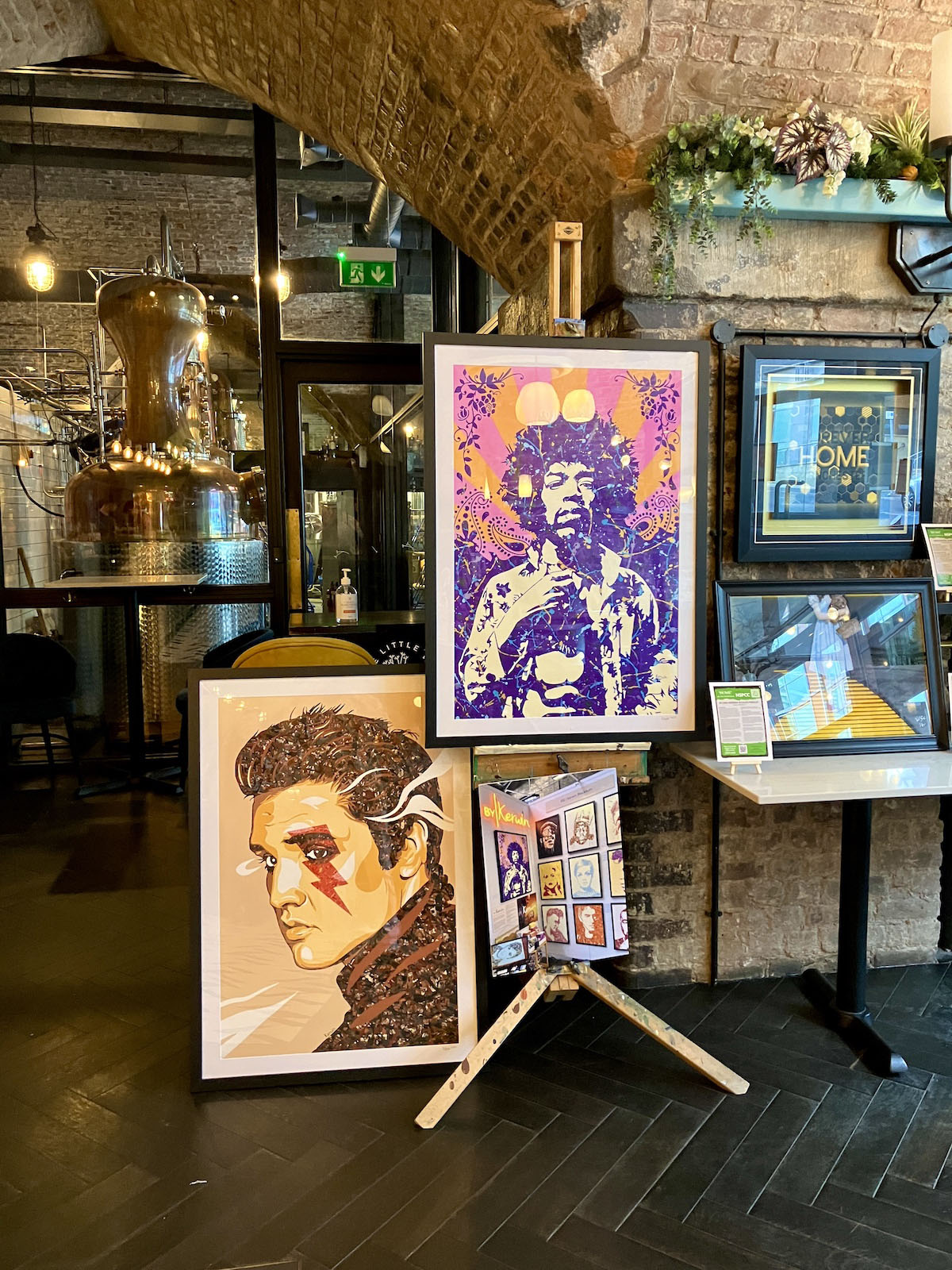 Jimi Hendrix and Elvis prints at a charity fundraiser in Manchester, June 2023