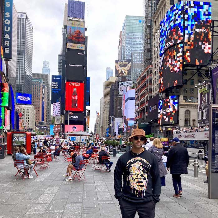 Kerwin Blackburn in Times Square for his New York exhibition with The Other Art Fair, June 2022