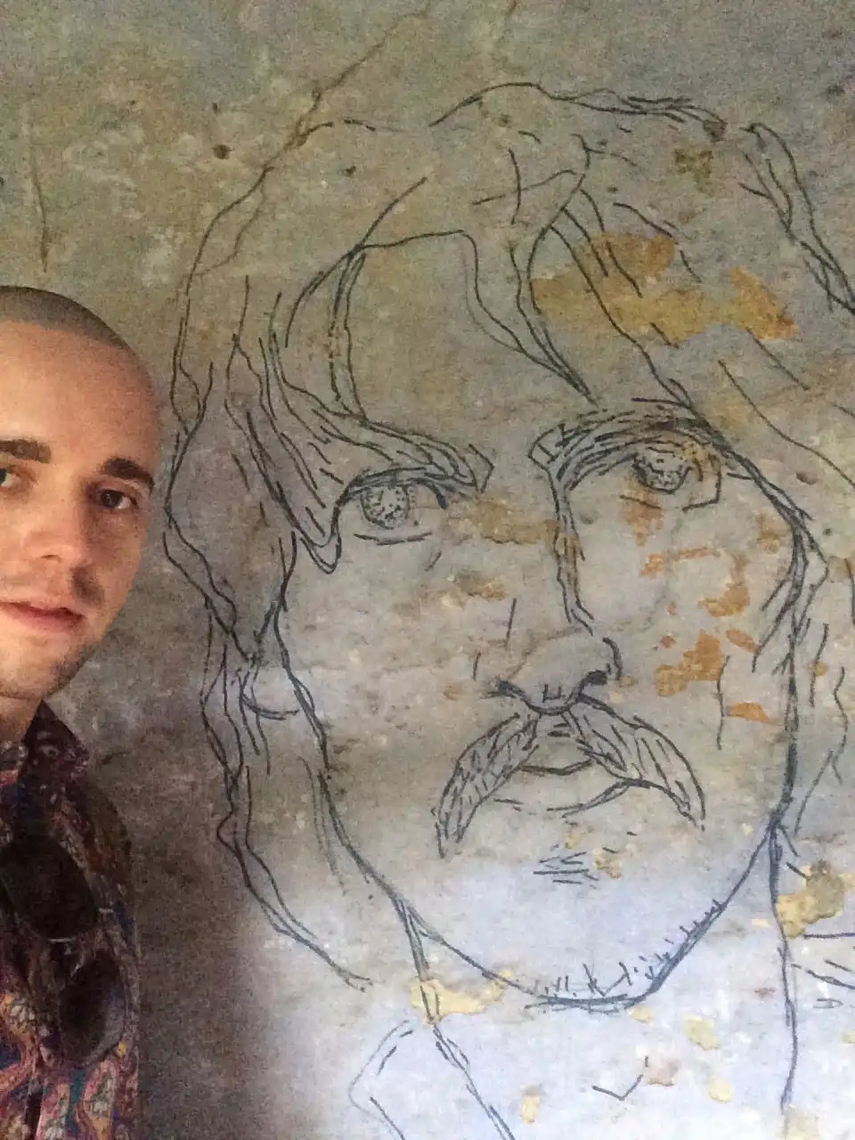 Kerwin in Rishikesh, India at the Beatles ashram | George Harrison graffiti